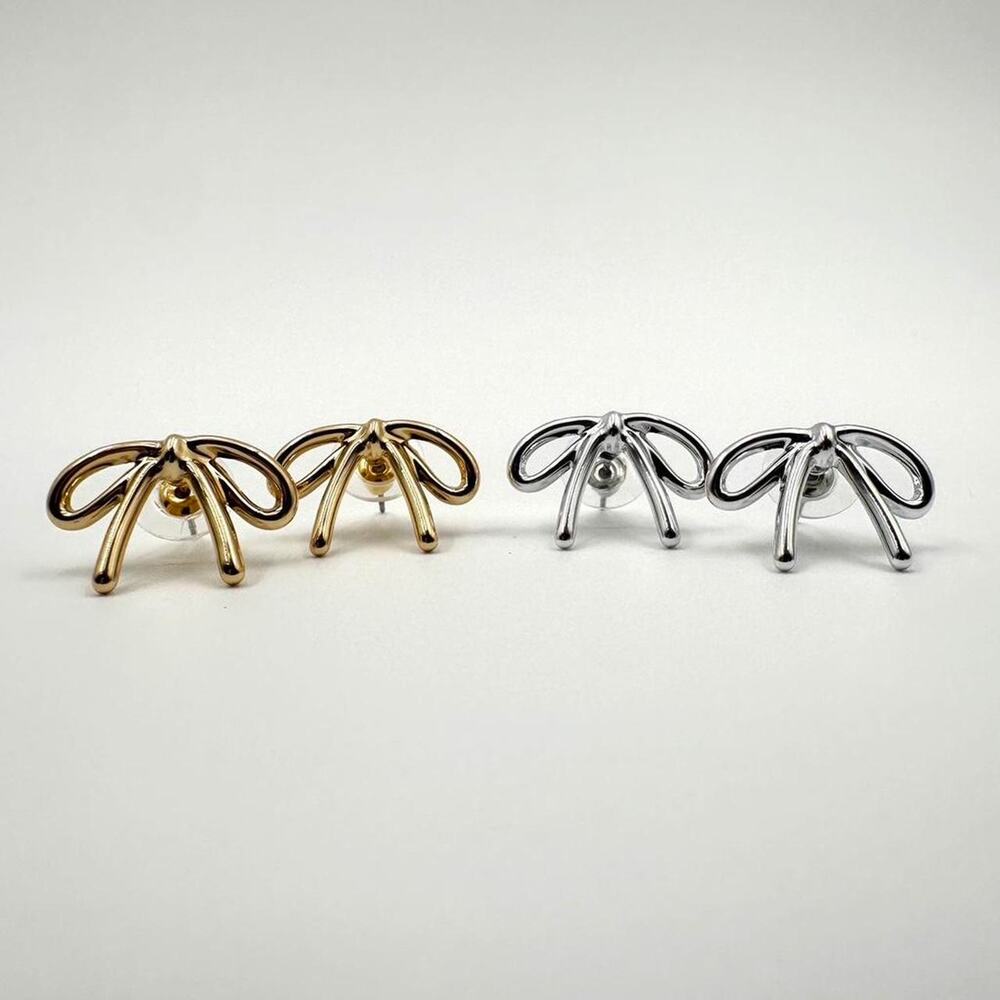 Gold and silver bow earrings